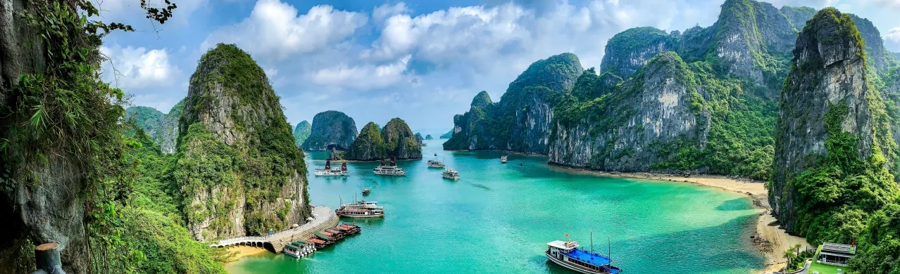 Scenic Vietnam travel destination featuring tropical beaches, mountains, cultural landmarks, and vibrant city experiences