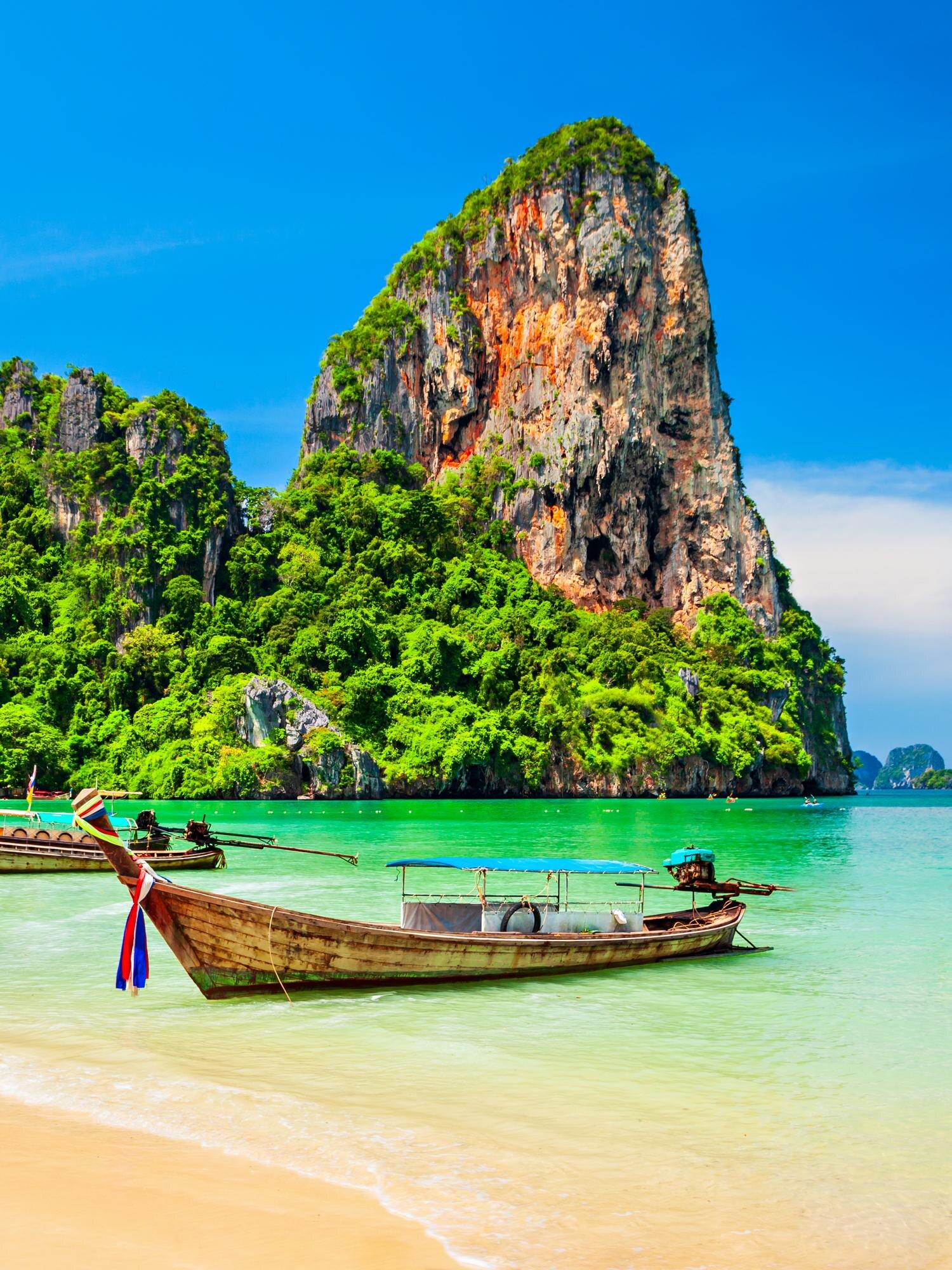 Thailand travel destination featuring tropical beaches, temples and vibrant city life