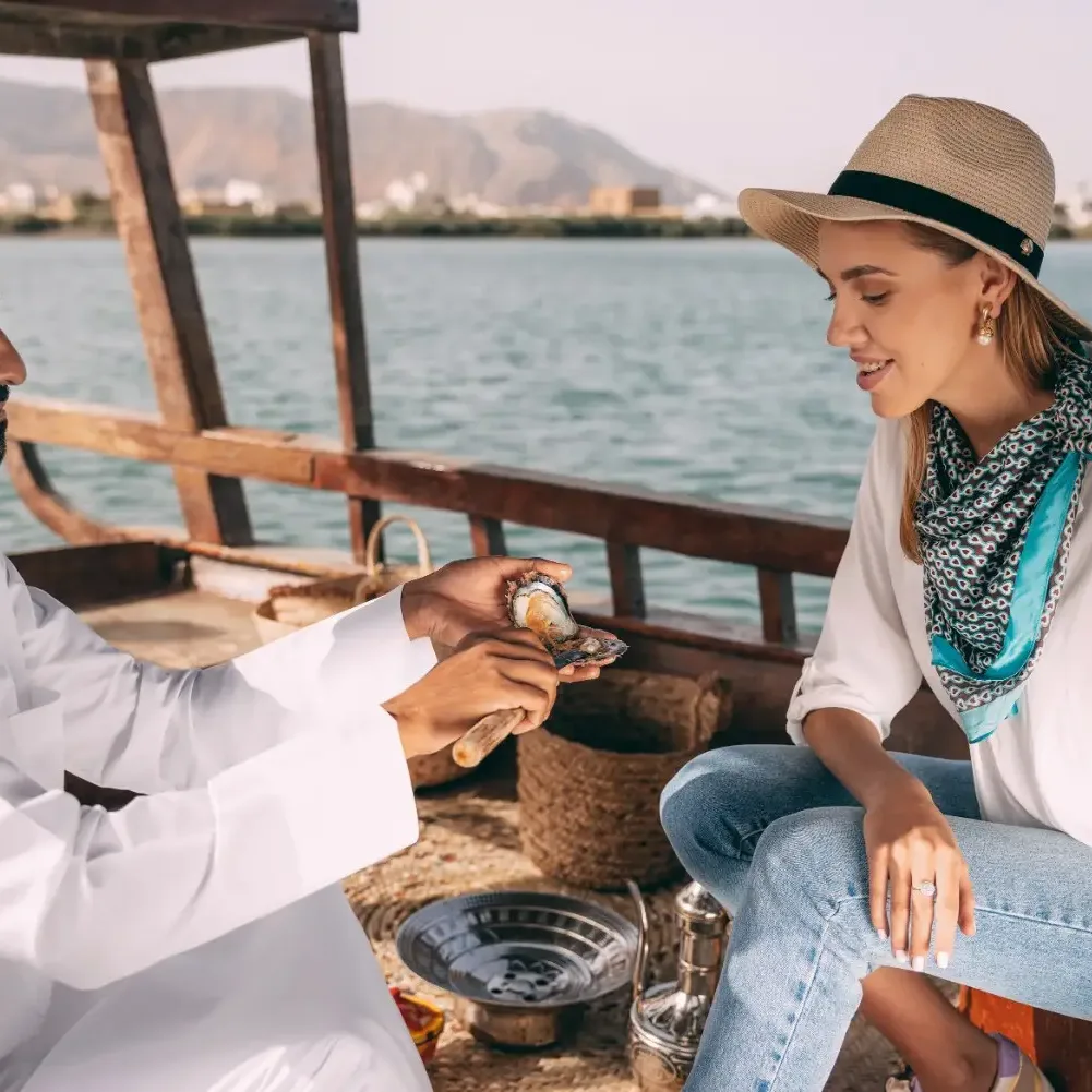 Suwaidi Pearls farm with traditional boats and pearl cultivation experience