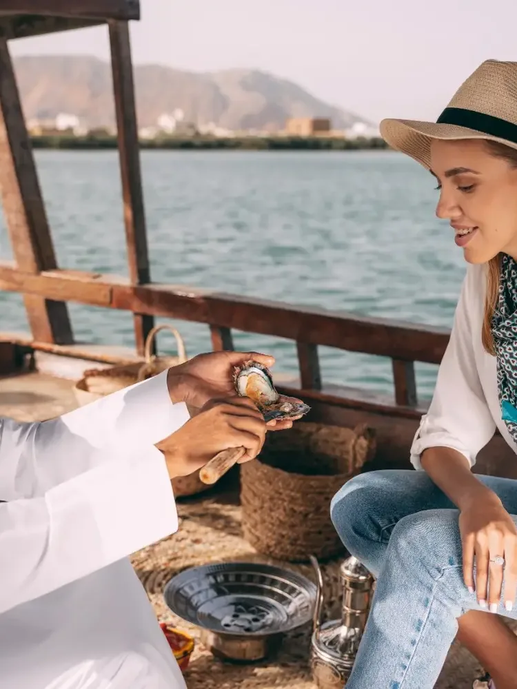 Suwaidi Pearls farm with traditional boats and pearl cultivation experience