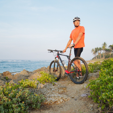 Mountain bikers riding coastal trails between Mirissa and Unawatuna Sri Lanka