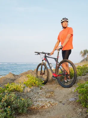 Mountain bikers riding coastal trails between Mirissa and Unawatuna Sri Lanka