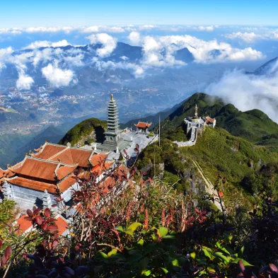 Fansipan Mountain in Sapa with cable car views and misty mountain landscapes