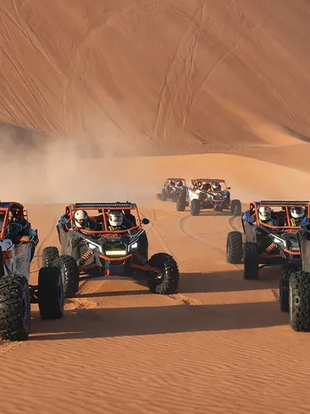 Luxury desert safari with private dining and sunset dune views