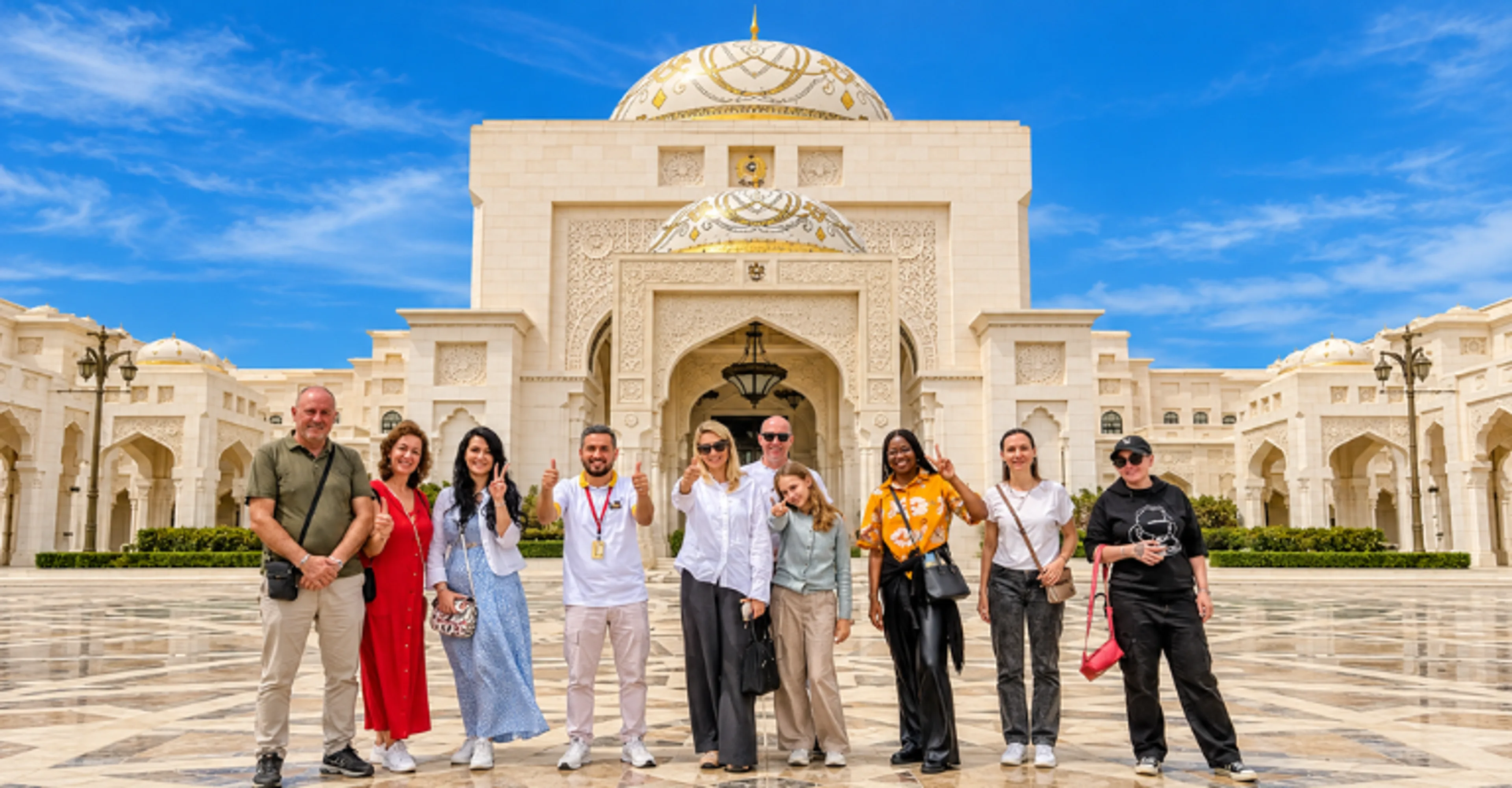 Tour group posing outside Qasr Al Watan, Abu Dhabi