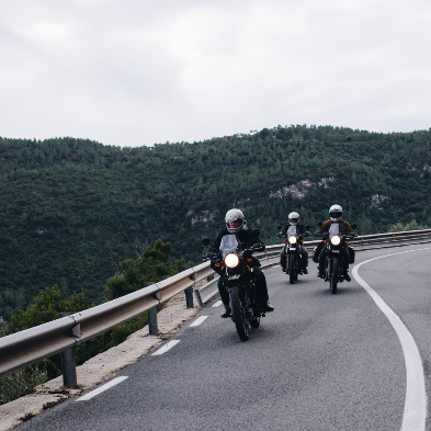 Motorbike riders on the winding mountain passes of the Hà Giang Loop Vietnam