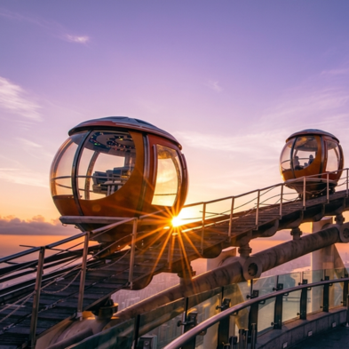 Visitors on the open-air Canton Tower Sky Walk observation deck overlooking Guangzhou skyline