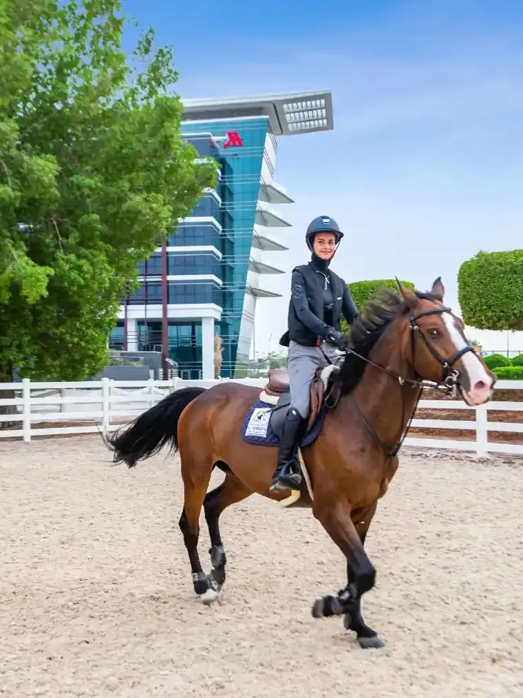 Horse riding and polo activity at Dubai polo and equestrian club
