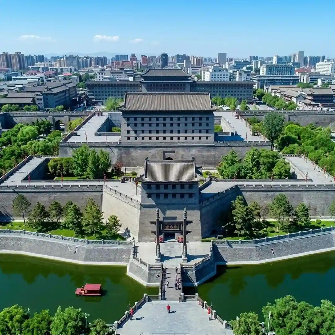Xi'an Ming City Wall with ancient stone fortifications, cycling path, and panoramic city views