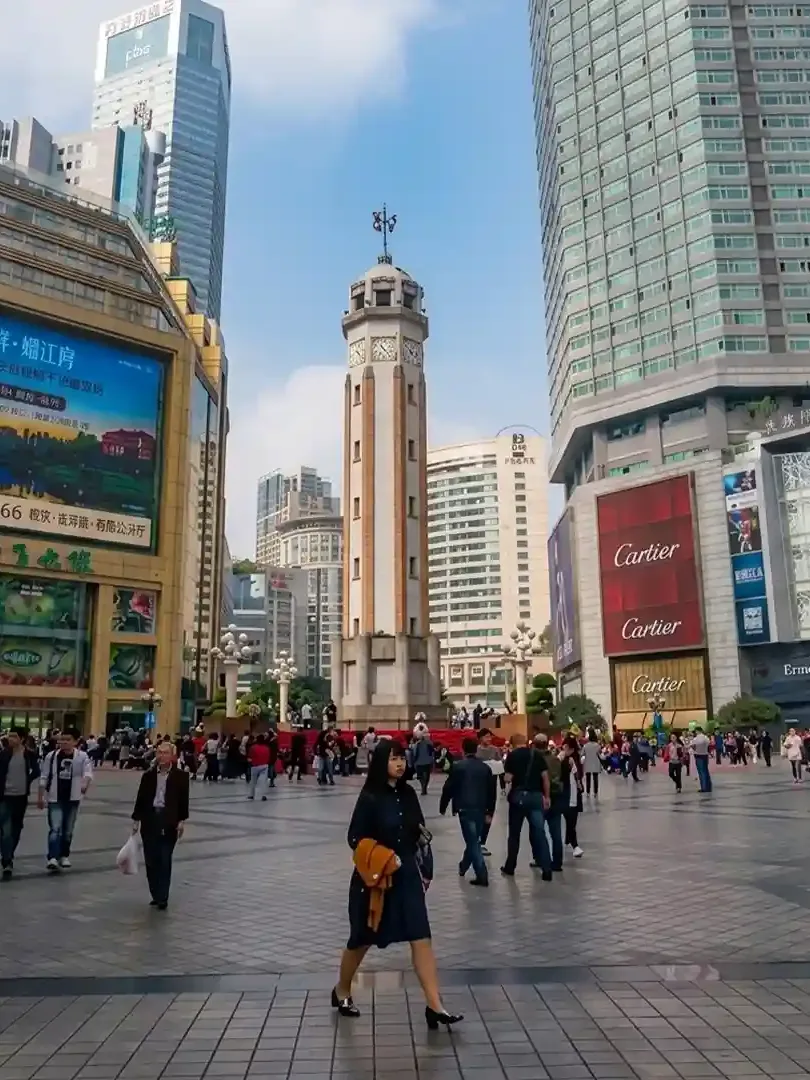 Liberation Square Chongqing with modern buildings, busy pedestrian area, and city center atmosphere