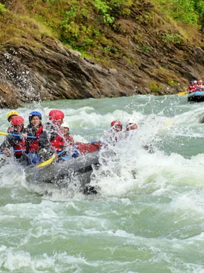 Rafters navigating white-water rapids on the Kelani River at Kitulgala Sri Lanka