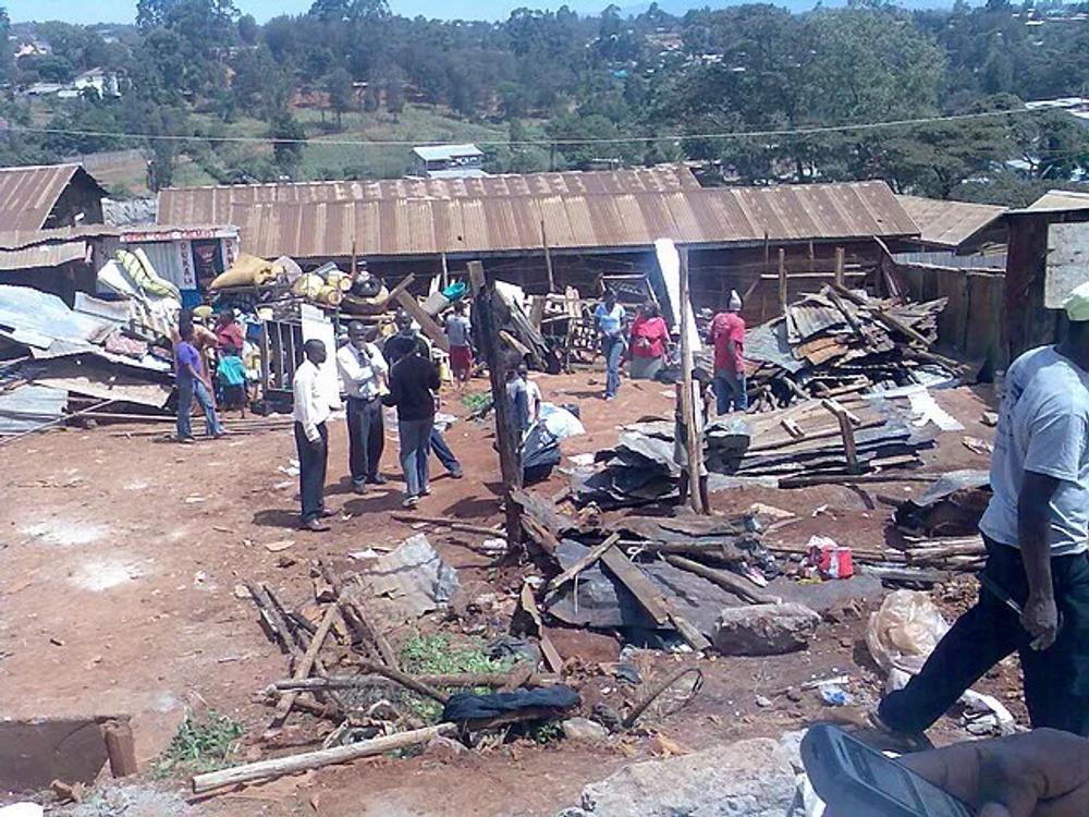 First came the floods that washed away people’s homes, then came the bulldozers that destroyed everything that was left’  cover