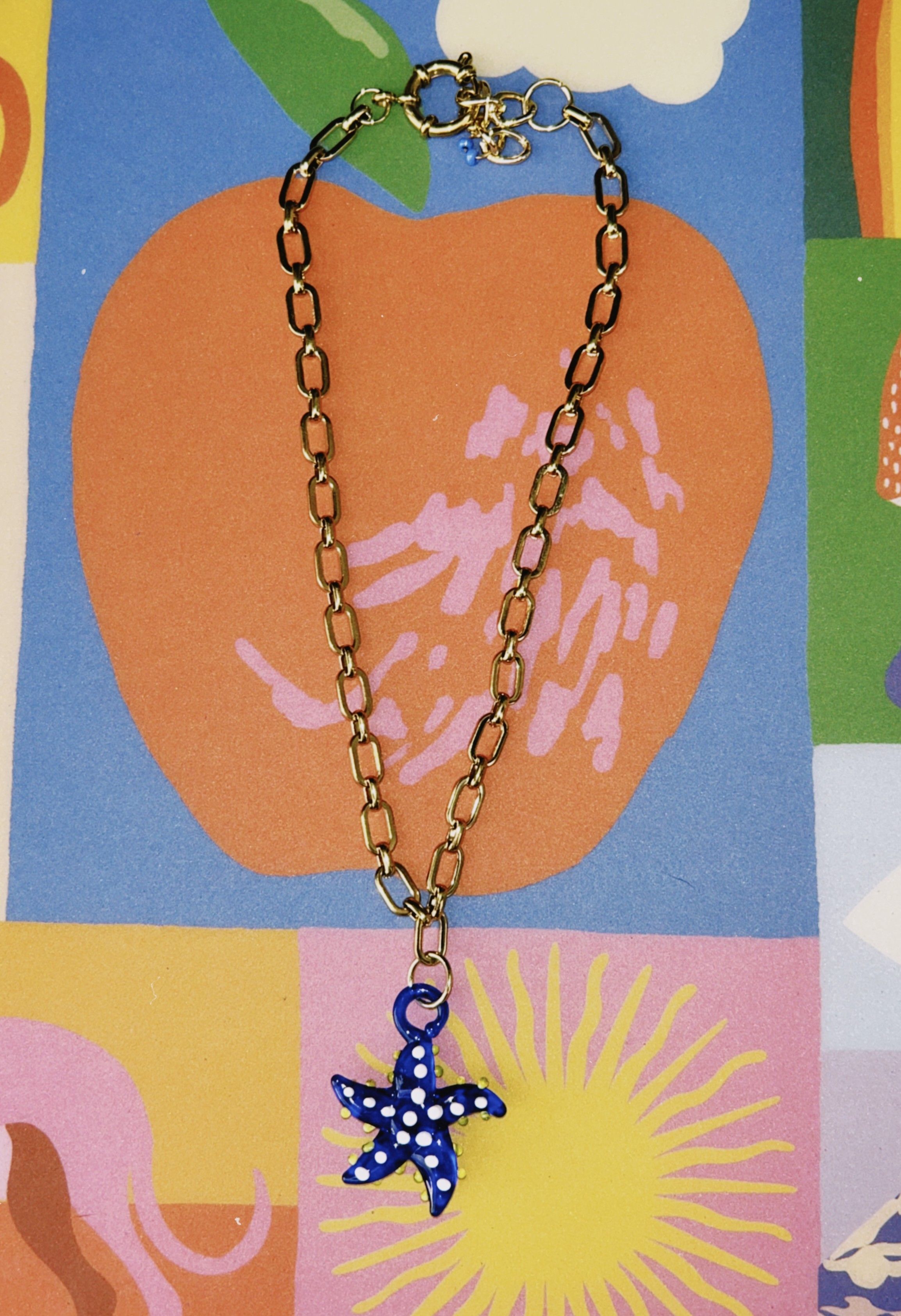 collar de cadena de acero inoxidable y flor de vidrio