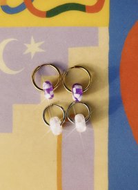 pendientes de acero inoxidable en dorado y plateado con dijes de vidrio 