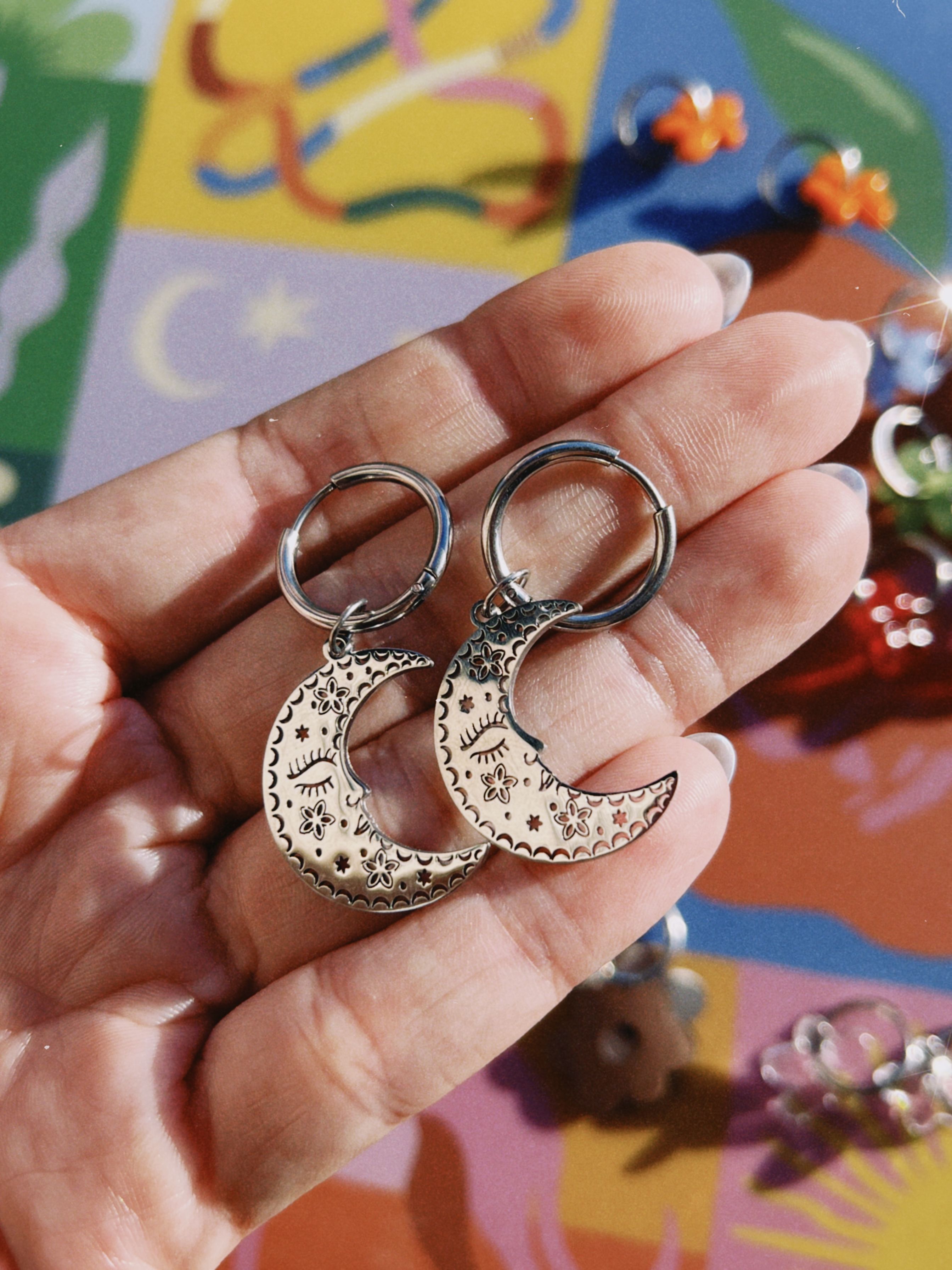 pendientes de acero inoxidable con dije de luna de acero