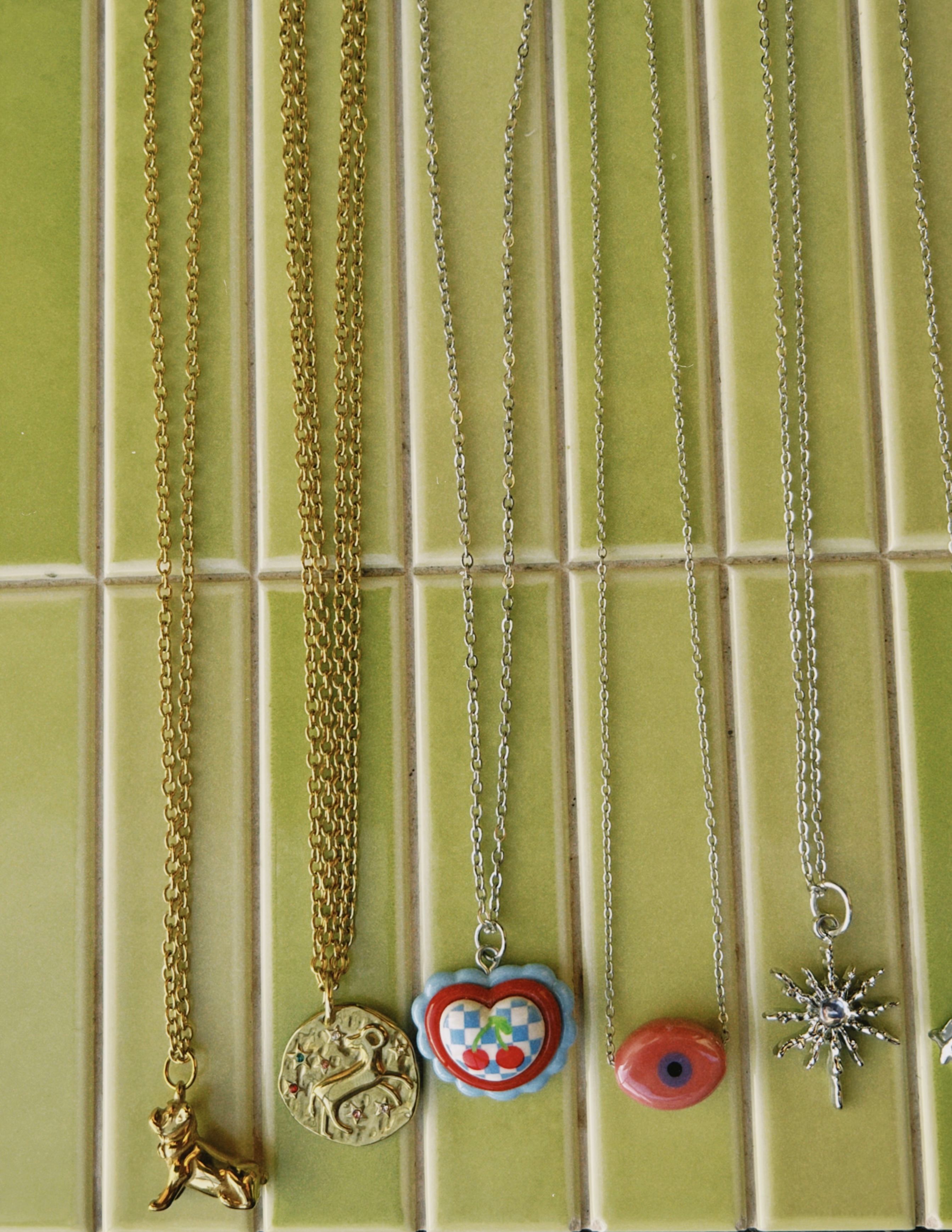 cadena de acero y dije