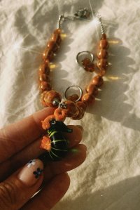 pack de collar con dije de vidrio soplado y pendientes de acero y piedras, super artesanal y únicos