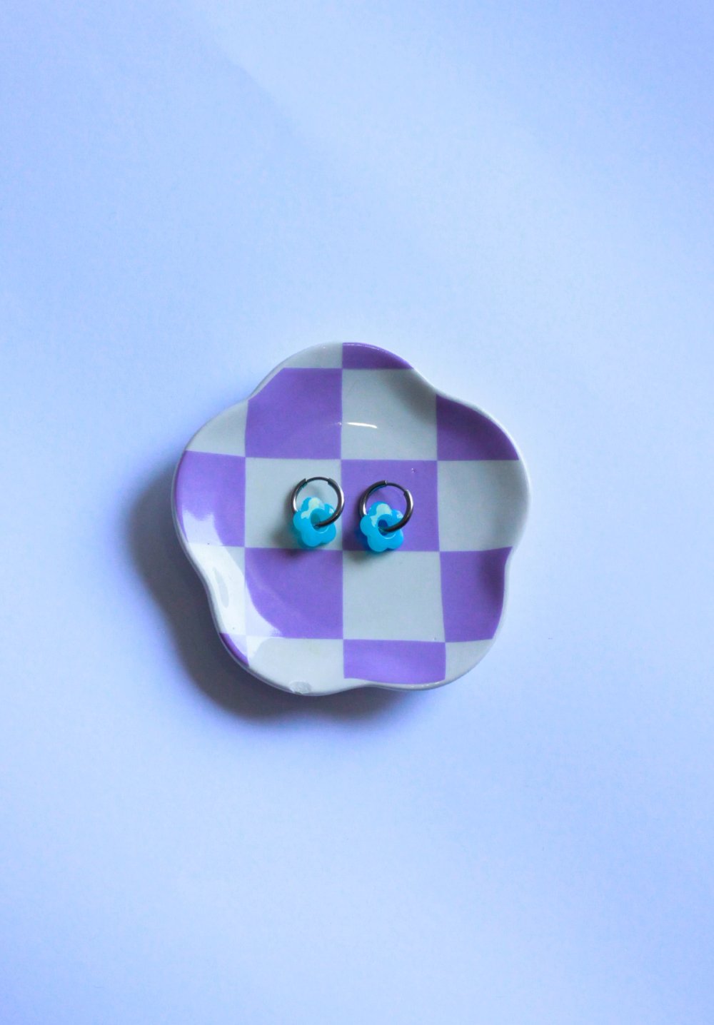 pendientes de acero de flor celeste