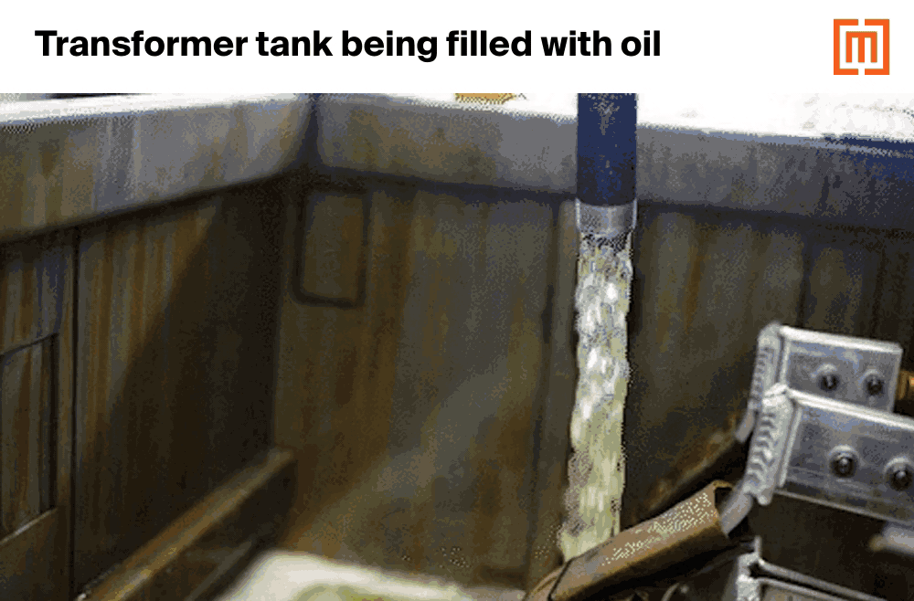 Padmount transformer tank being filled with oil