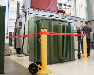 A padmount liquid filled transformer waiting to be tested