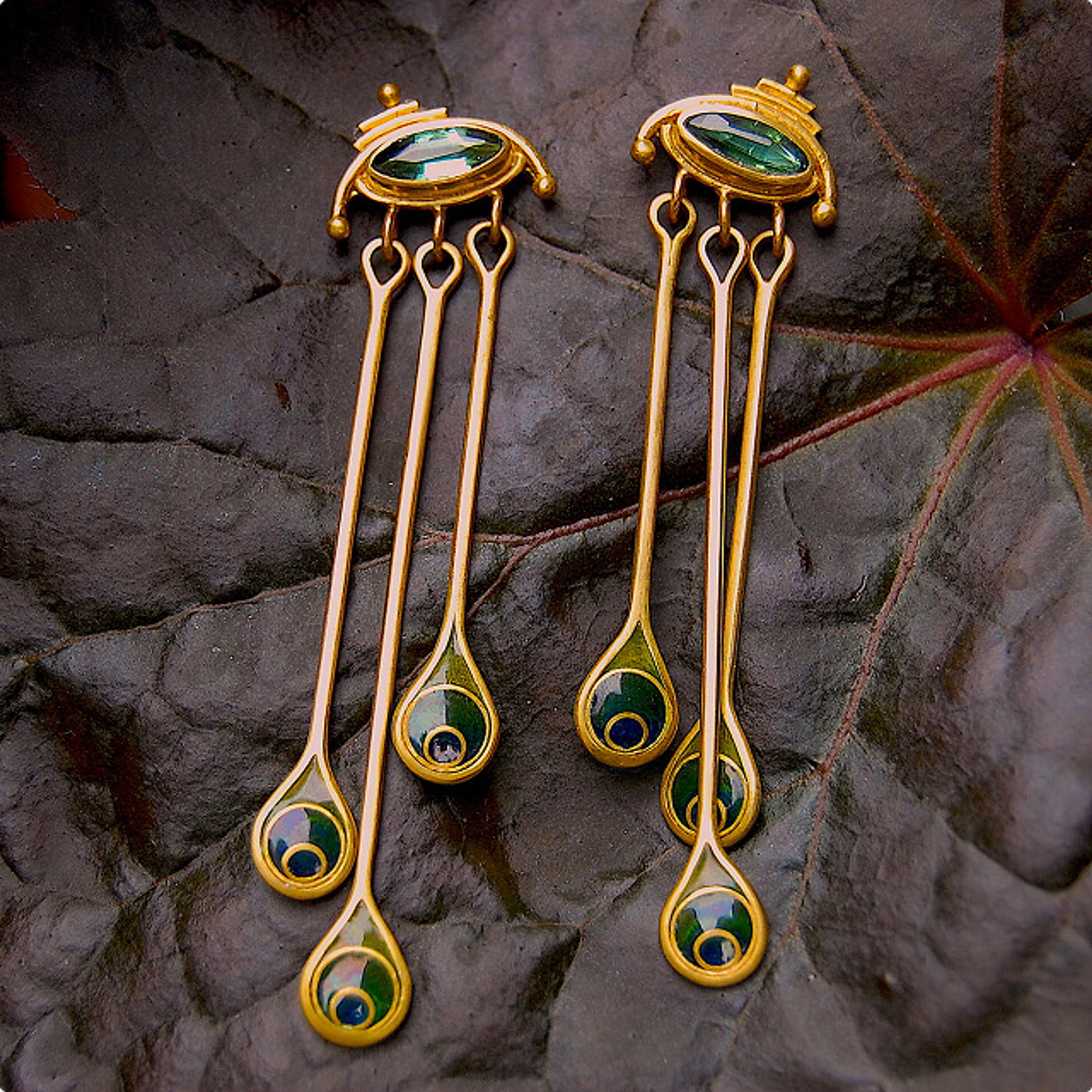 Gold earings with hanging gold and green enamel droplets