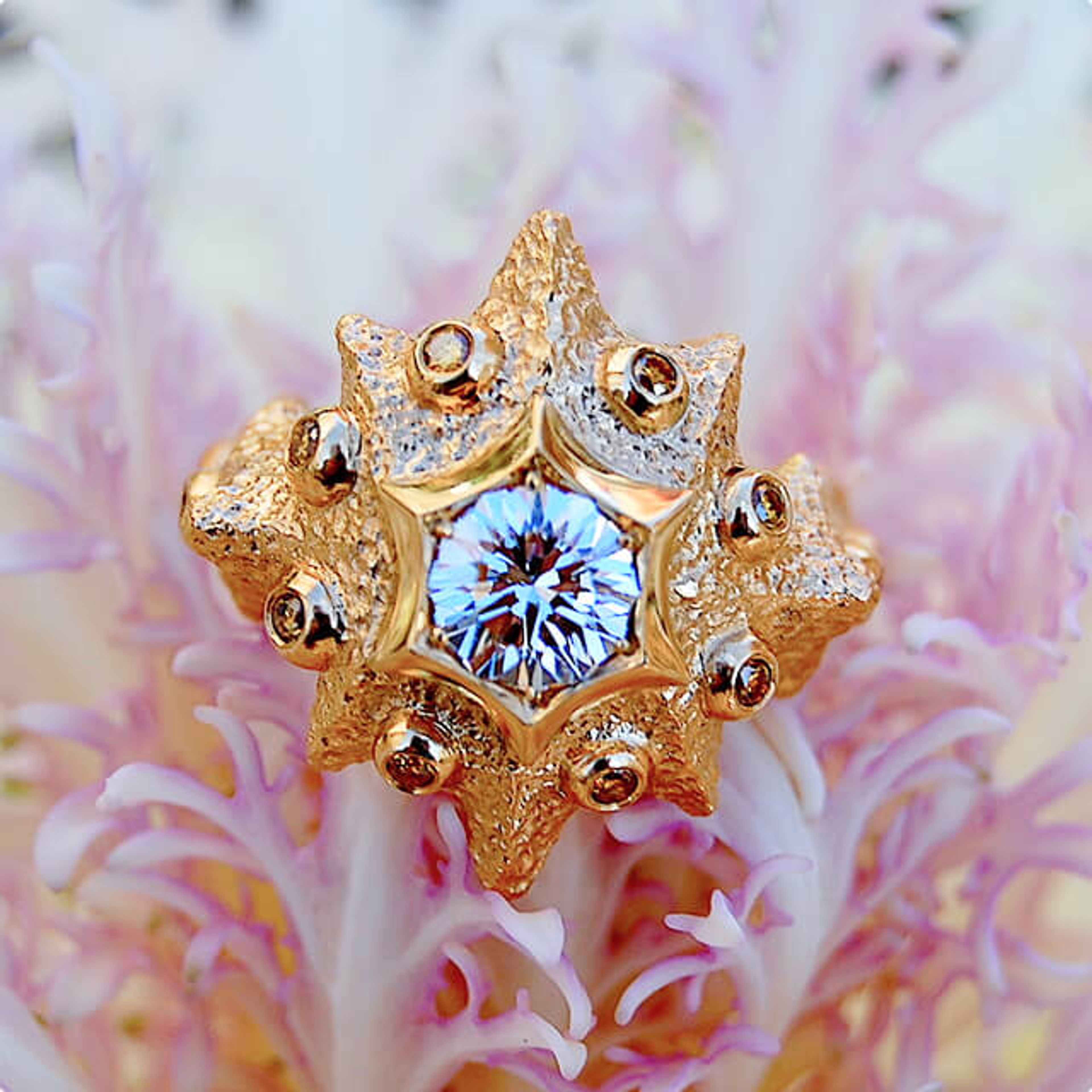 Gold ring with flower cut diamond