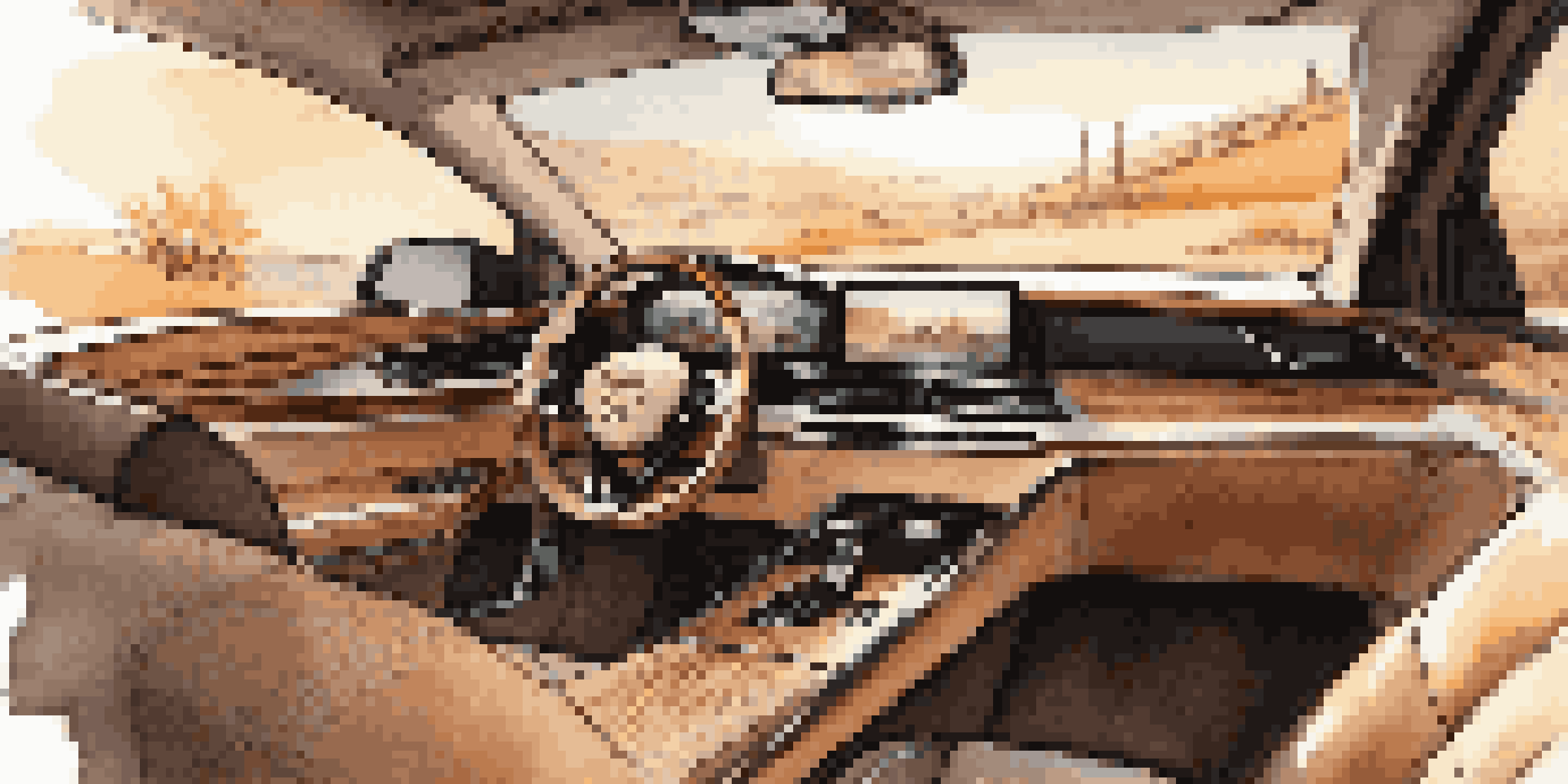 A luxurious car interior with eco-friendly materials, warm ambient lighting, and modern technology.