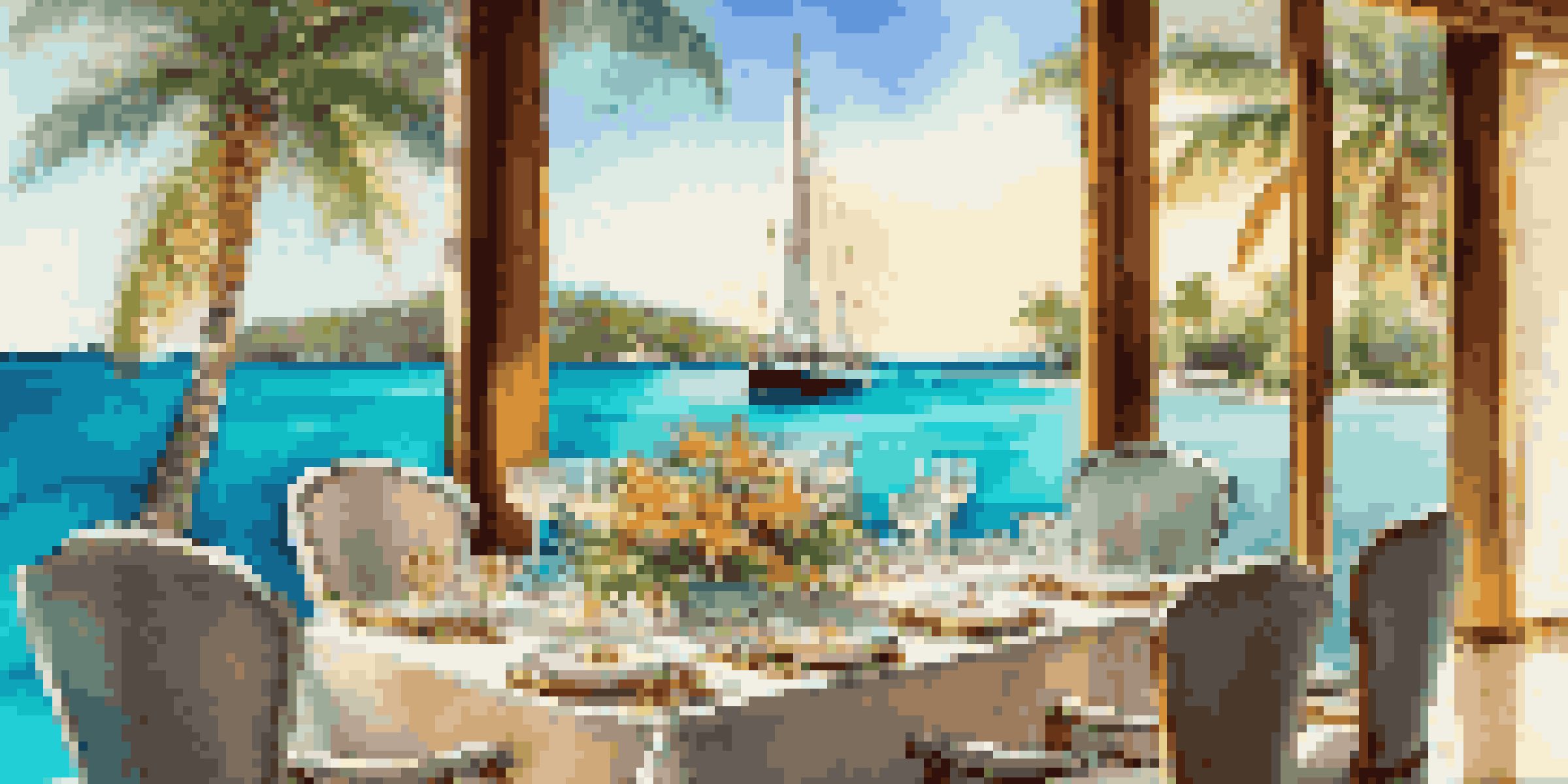 A private yacht in turquoise waters with a tropical island in the background, featuring a dining table set for an exclusive meal.