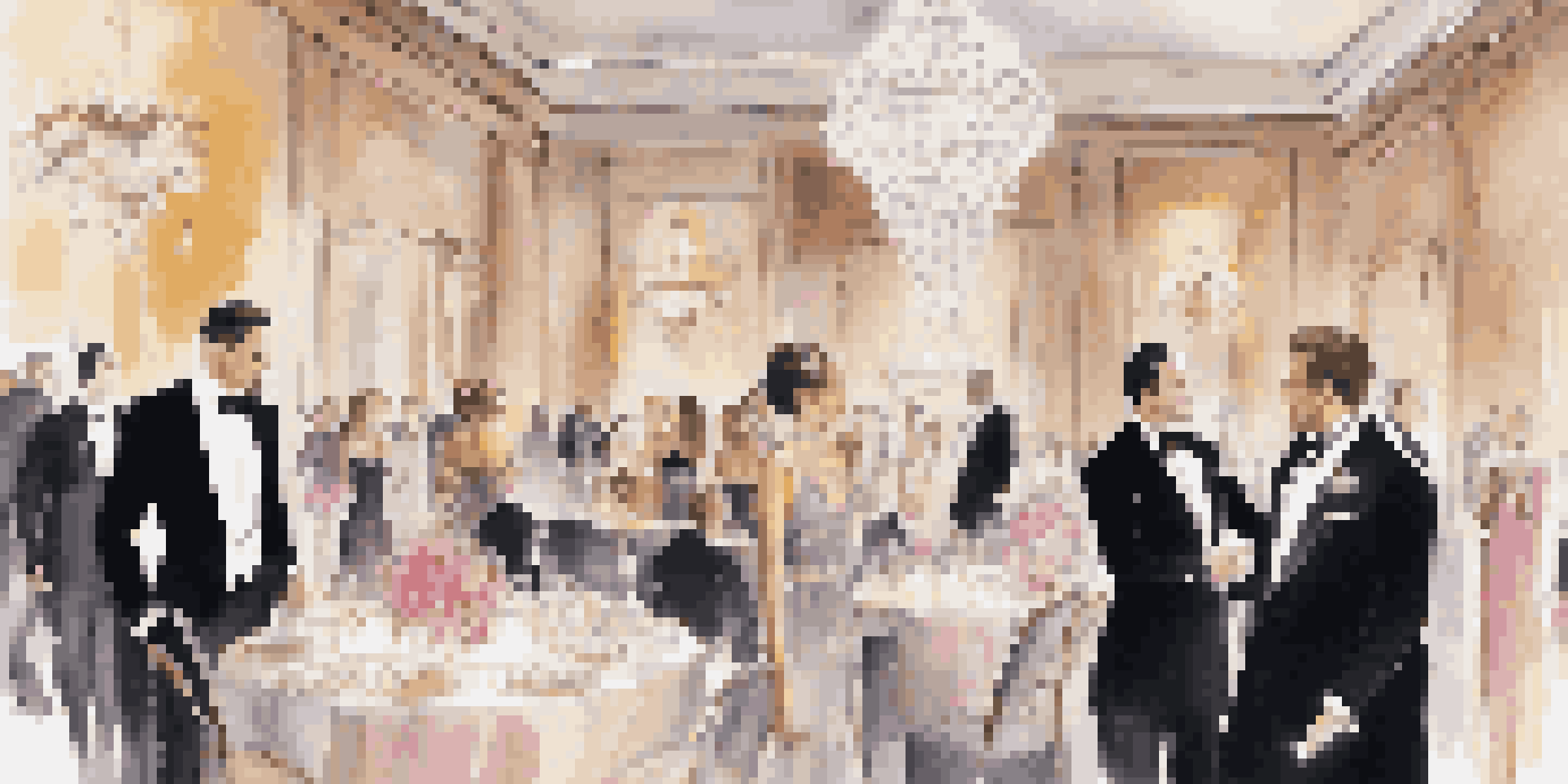 A glamorous event featuring elegantly dressed guests at a luxurious venue with beautiful floral decorations and chandeliers.