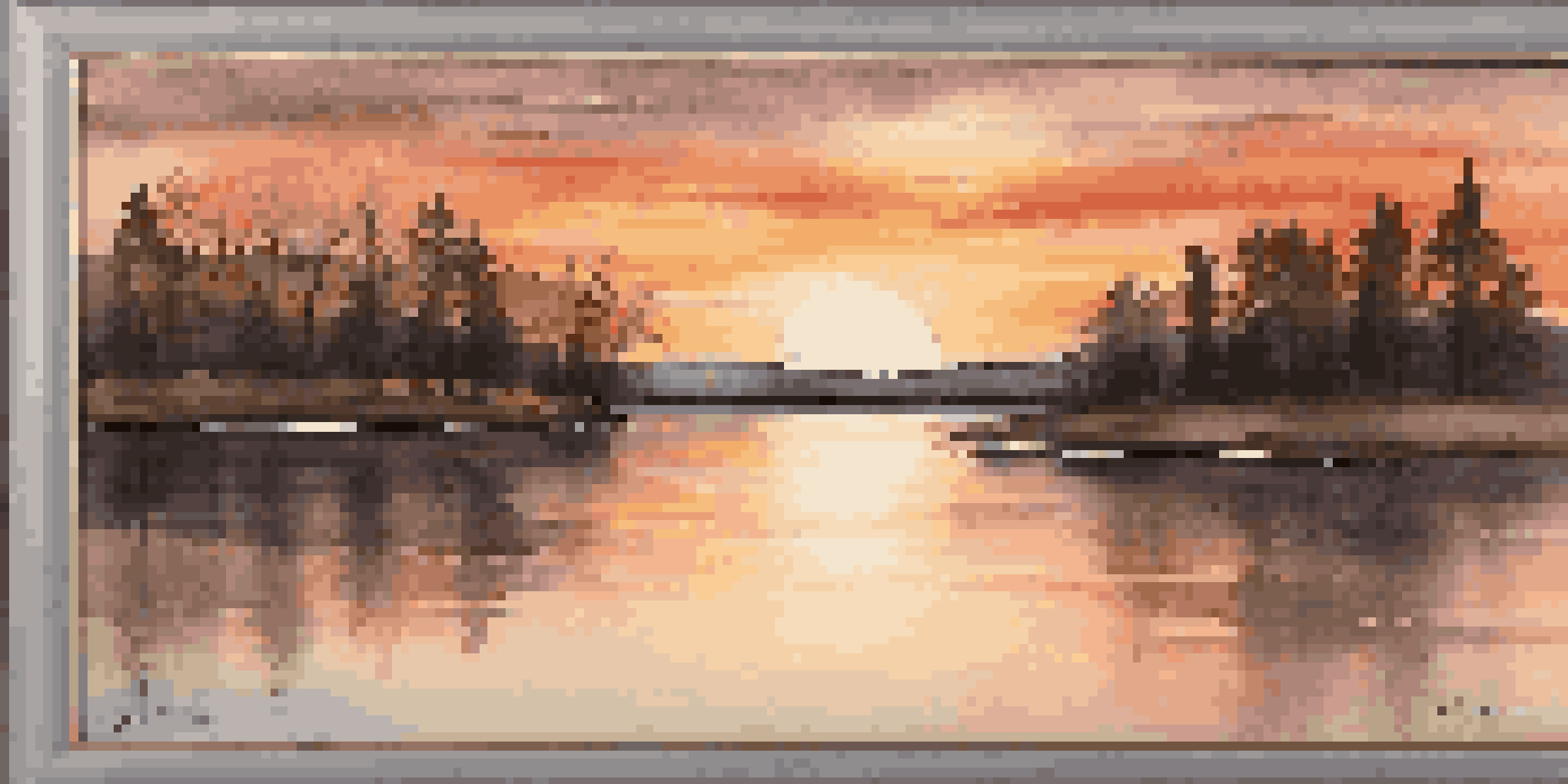 A landscape painting of a sunset over a lake, framed in a rustic wooden frame, showcasing warm colors and a tranquil atmosphere.