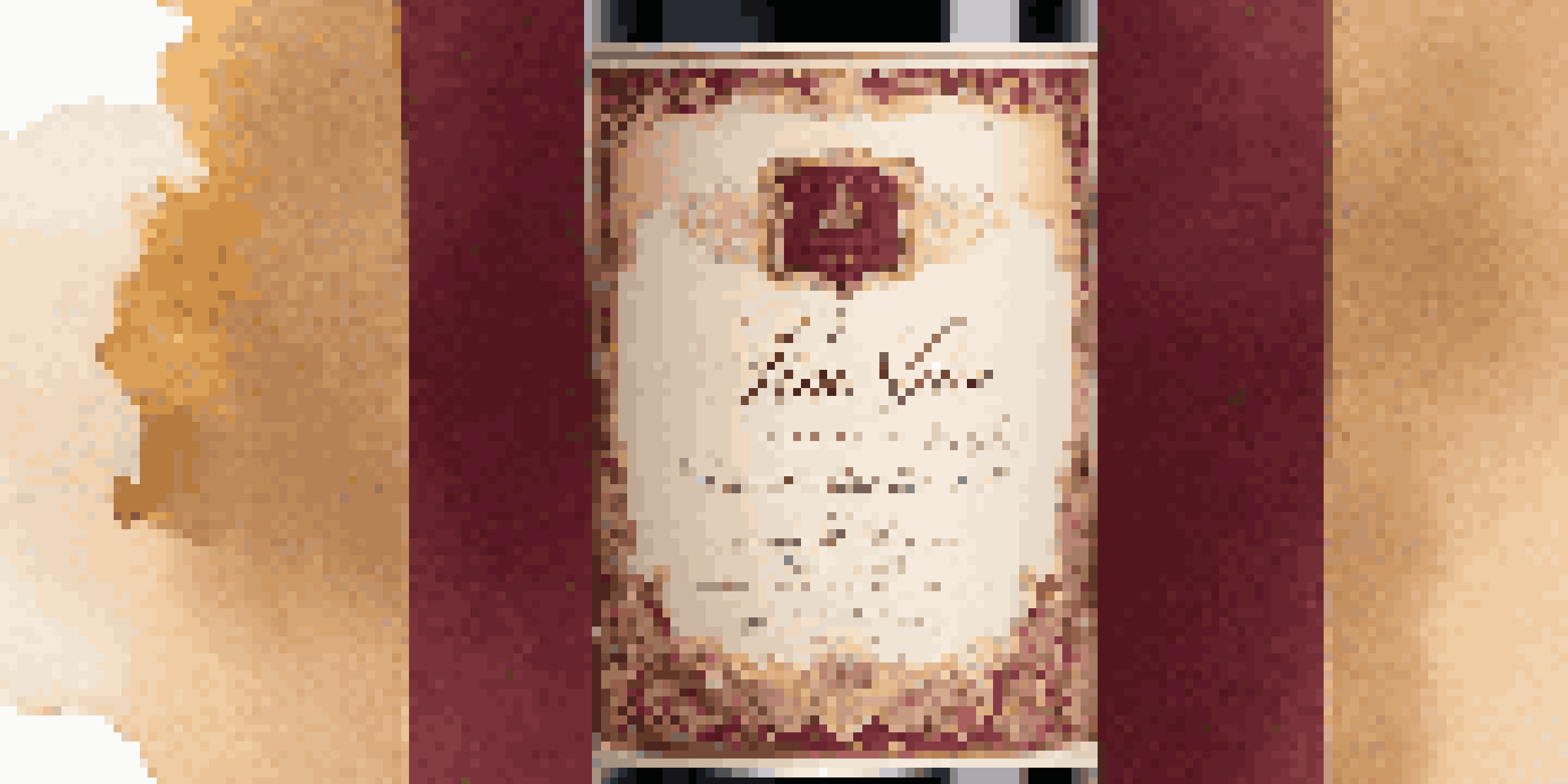 A detailed close-up of a wine label with elegant designs, showcasing the producer's name and vintage year.