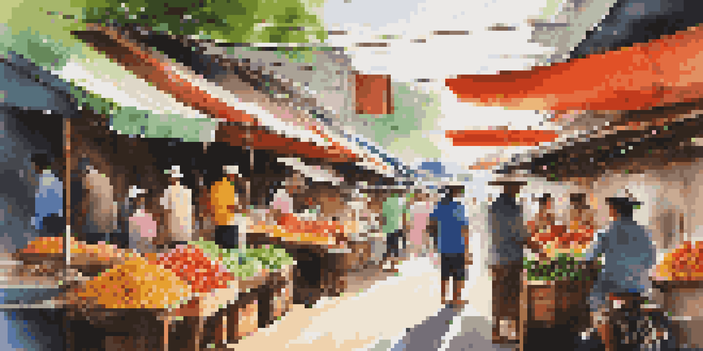 A lively market in Bangkok showcasing colorful fruits and vegetables with vendors and customers interacting.