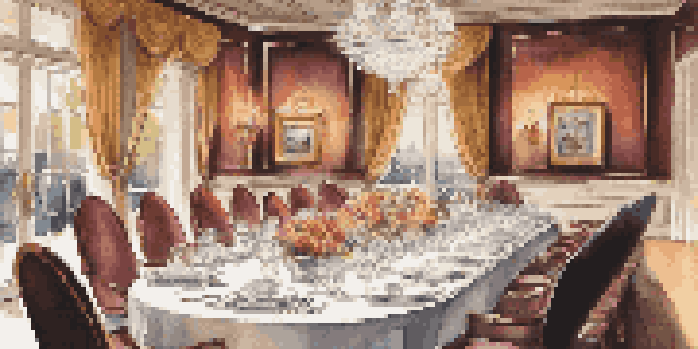 A beautifully set dining table in a luxurious room, featuring fine china, crystal glassware, and a gourmet meal being served.