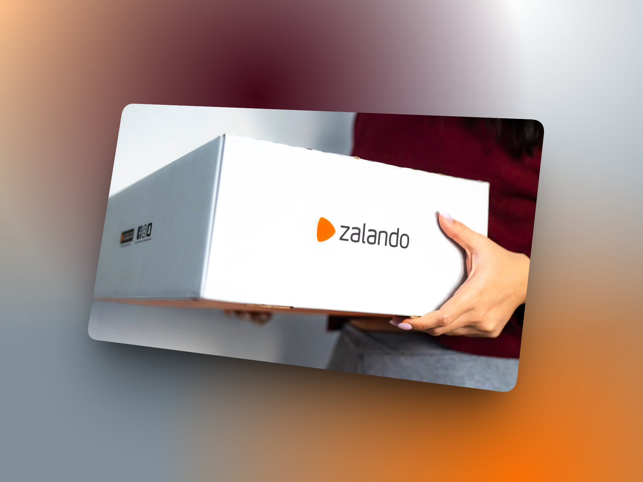 Hand die een verzenddoos van Zalando aanneemt