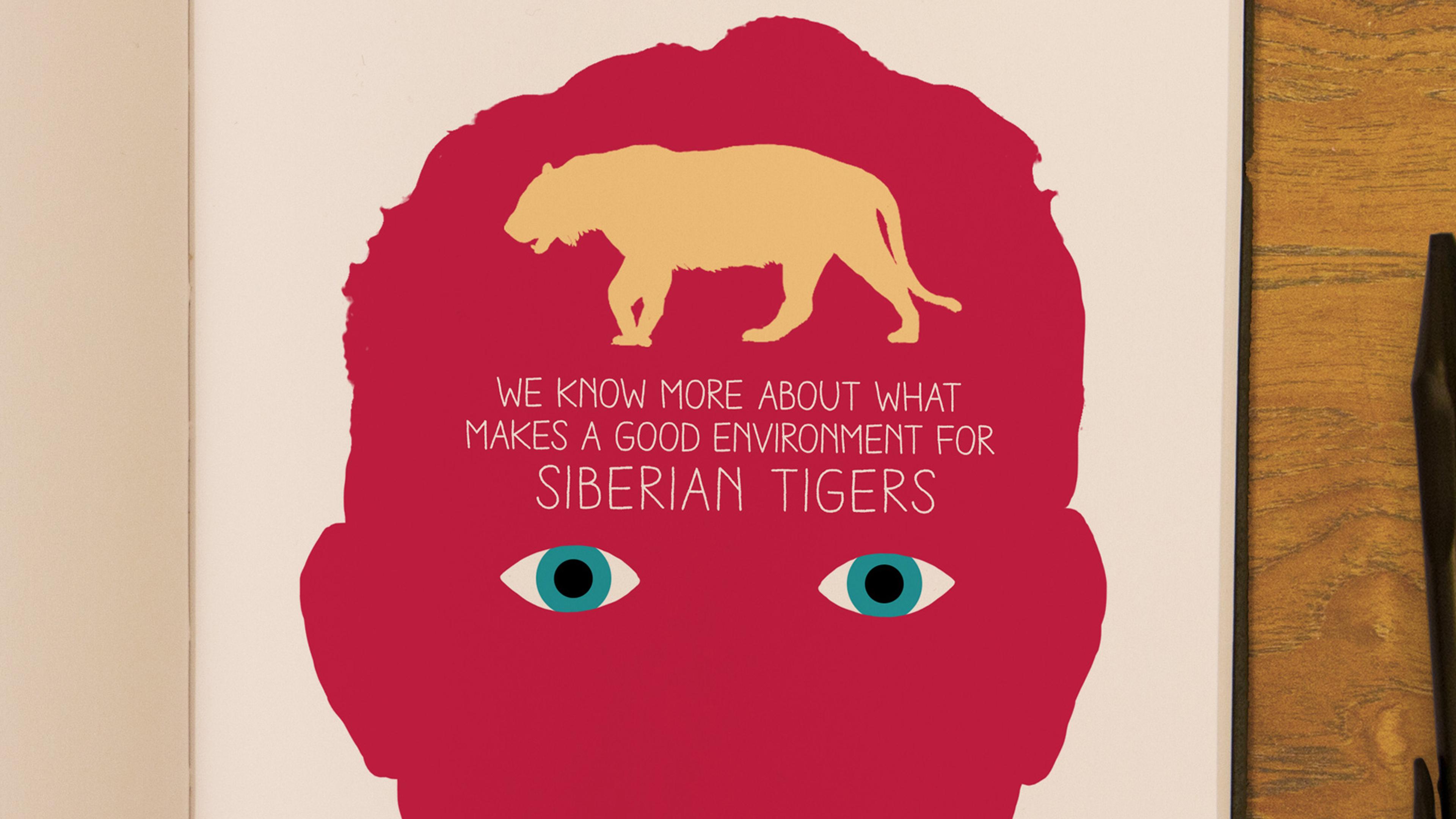 head silhouette with a tiger inside