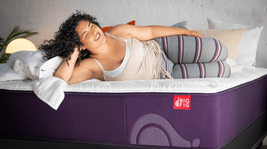 man laying on a big fig mattress