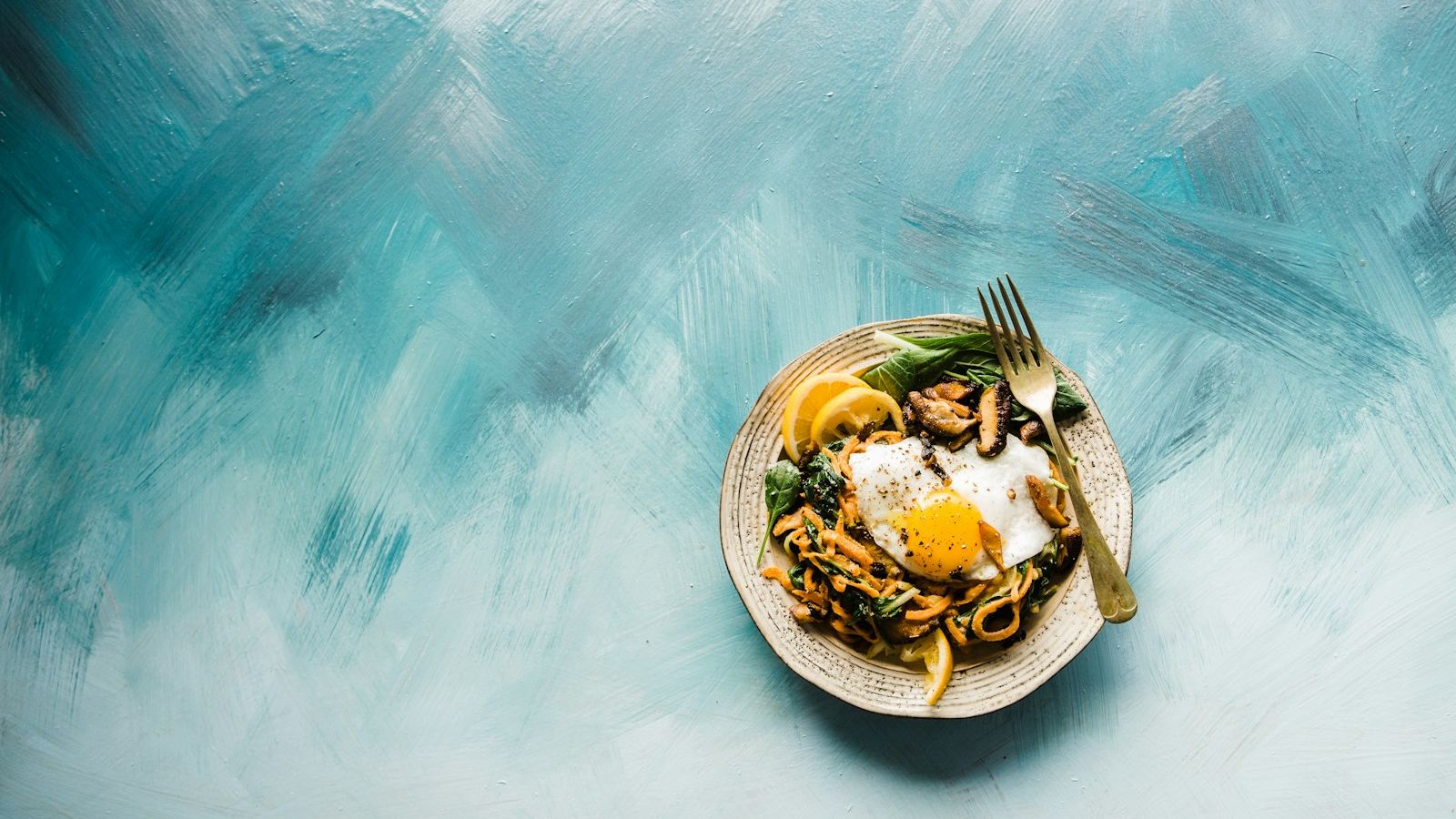 pasta dish on brown plate