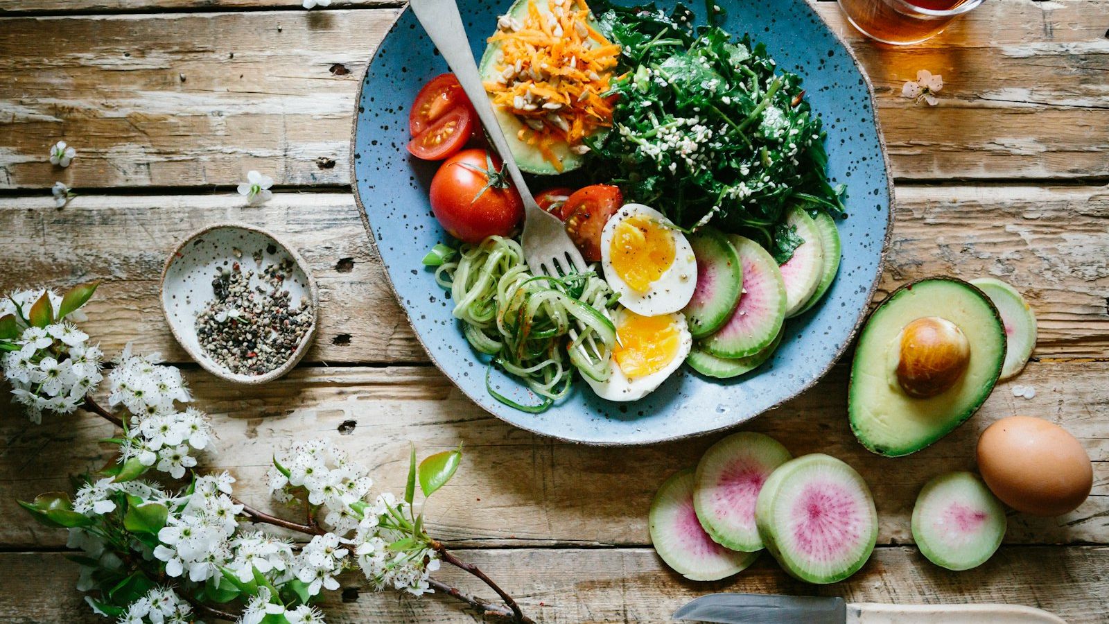 Healthy meal ingredients on a wooden surface