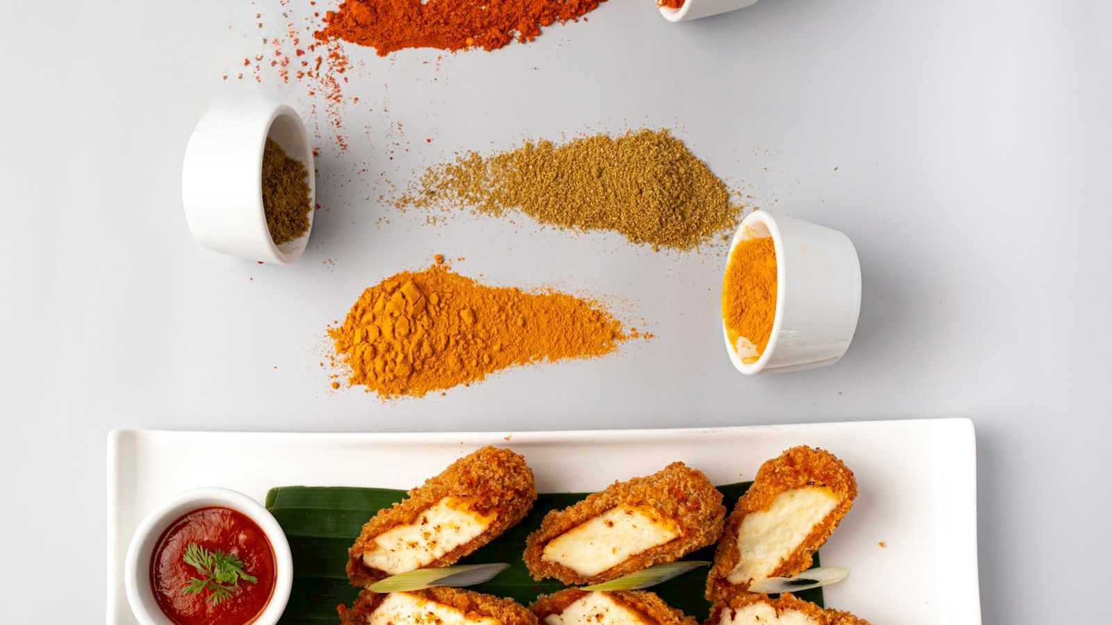 Fried tofu pieces with spices and dipping sauce