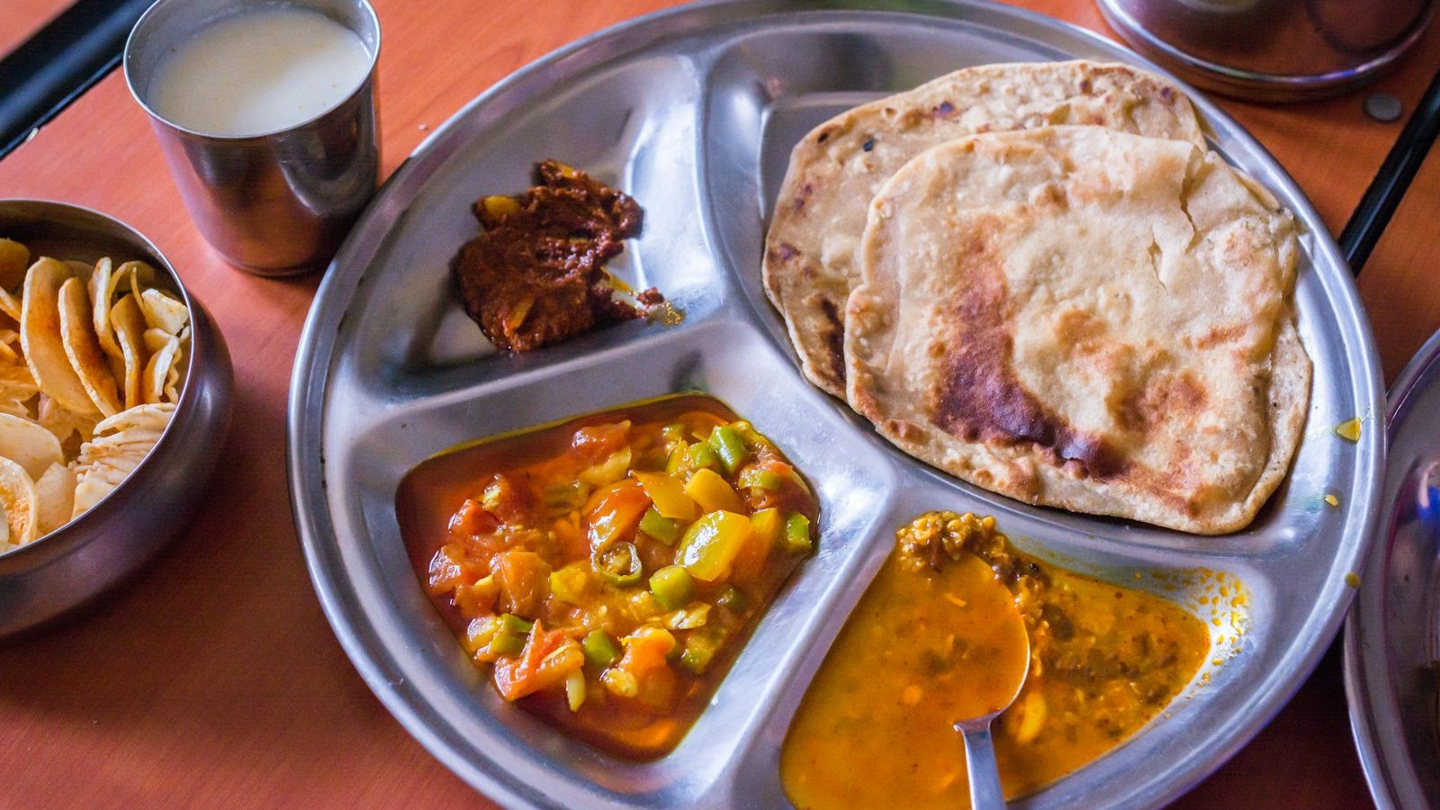 cooked food on round tray