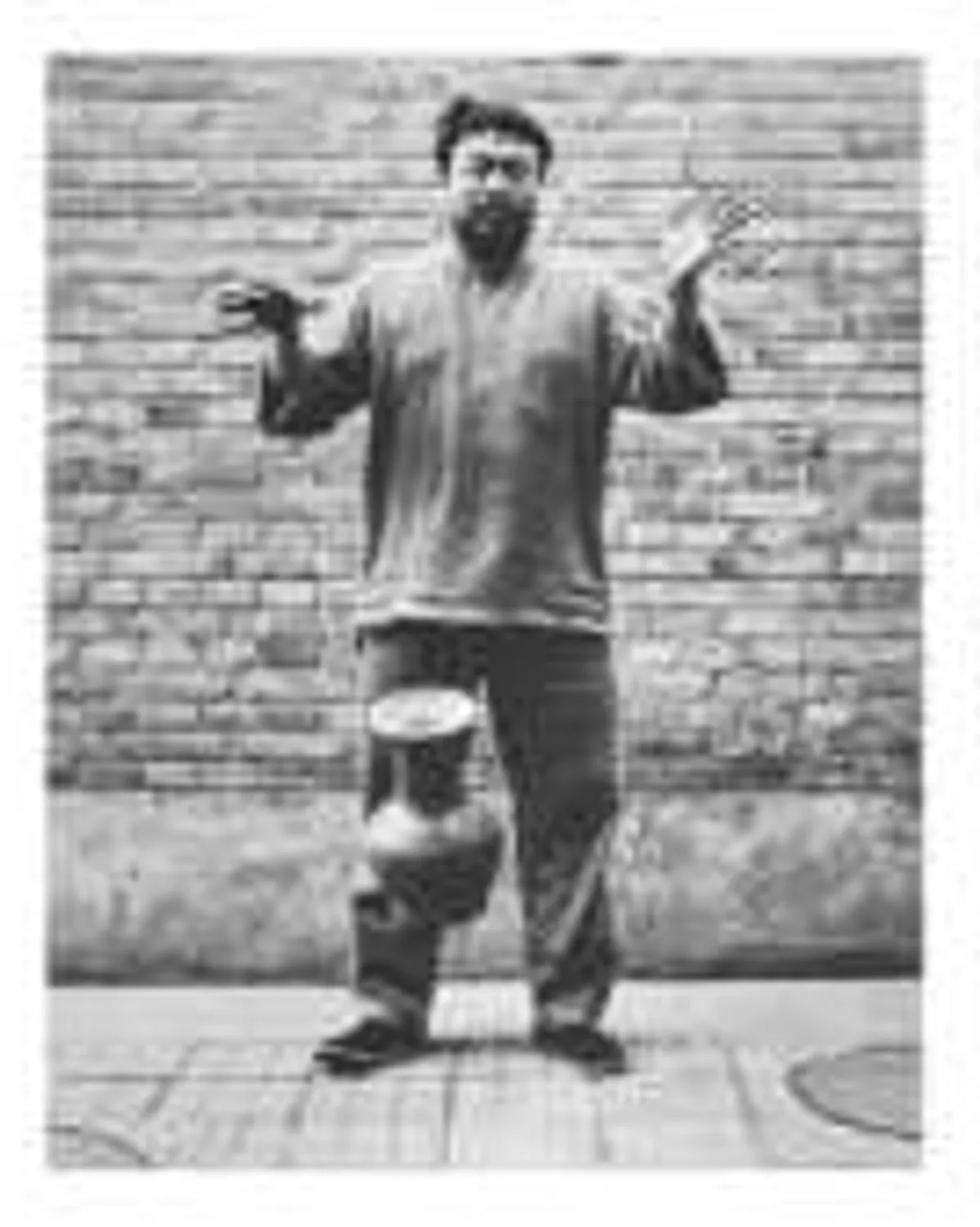 Dropping A Han Dynasty Urn by Ai Weiwei