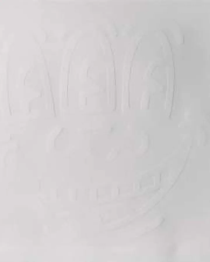 Three Eyed Monster (white) by Keith Haring