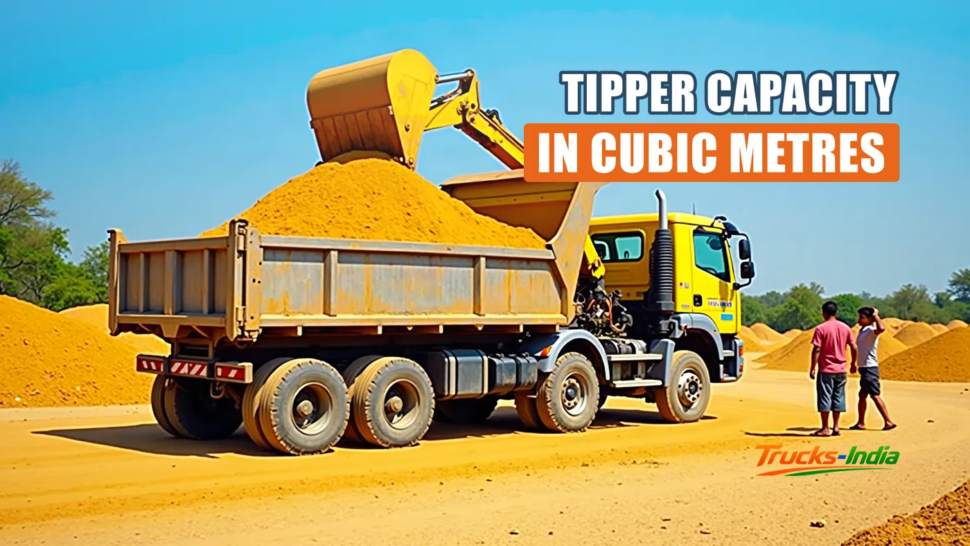 Excavator loading sand into a tipper truck at a sand yard