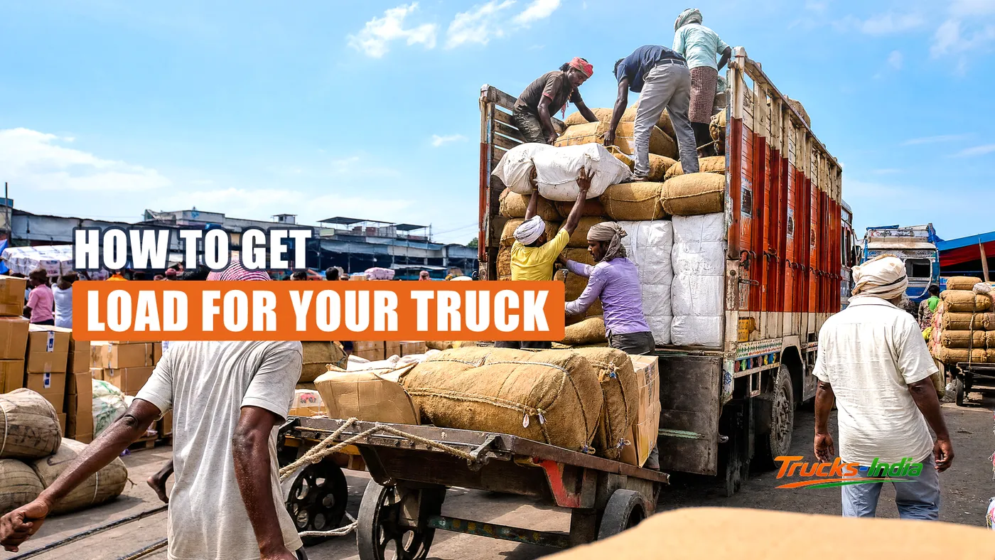Trucks loading at an Indian warehouse dock