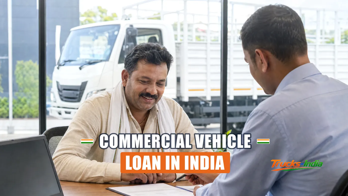 Truck owner reviewing commercial vehicle loan paperwork at an Indian dealership