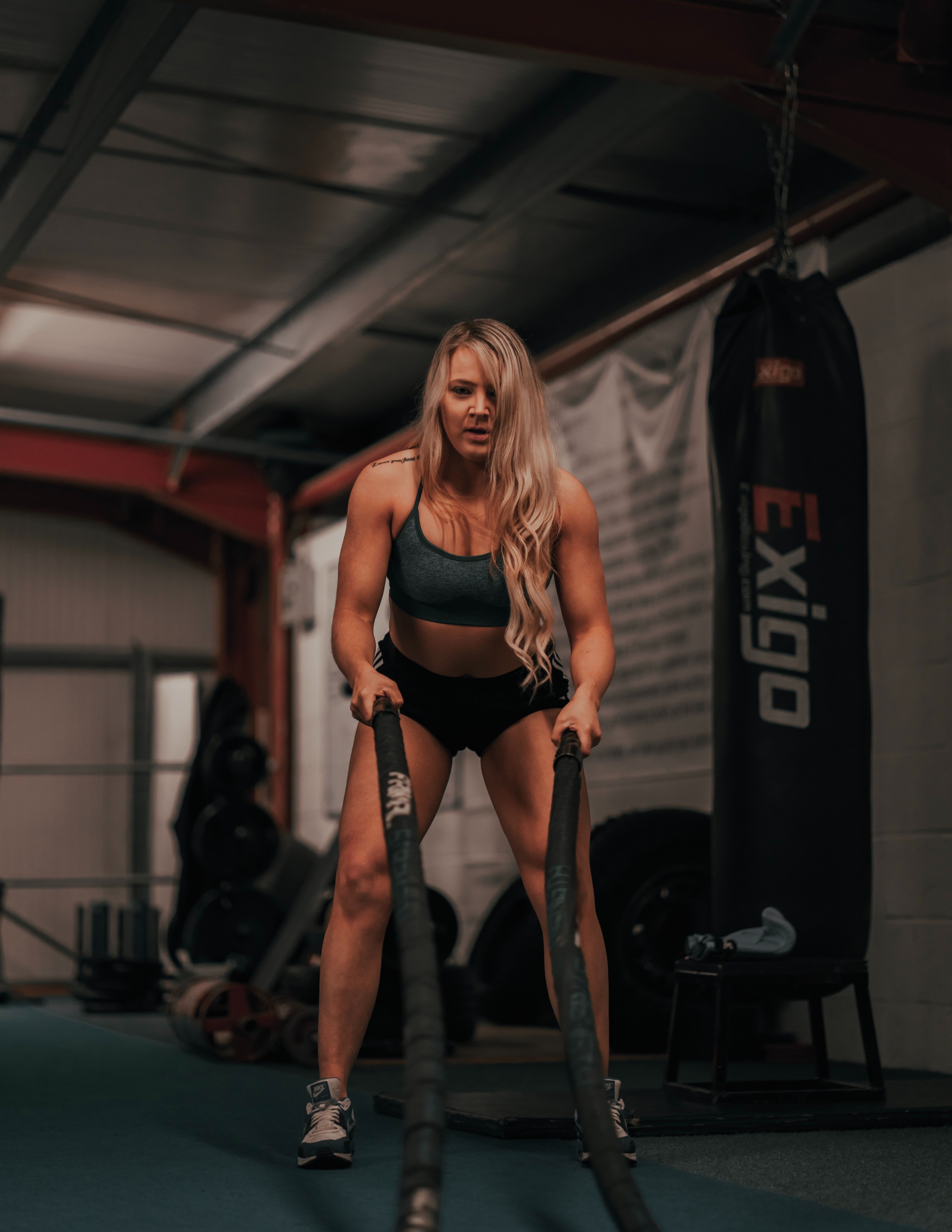 Blonde female performs workout