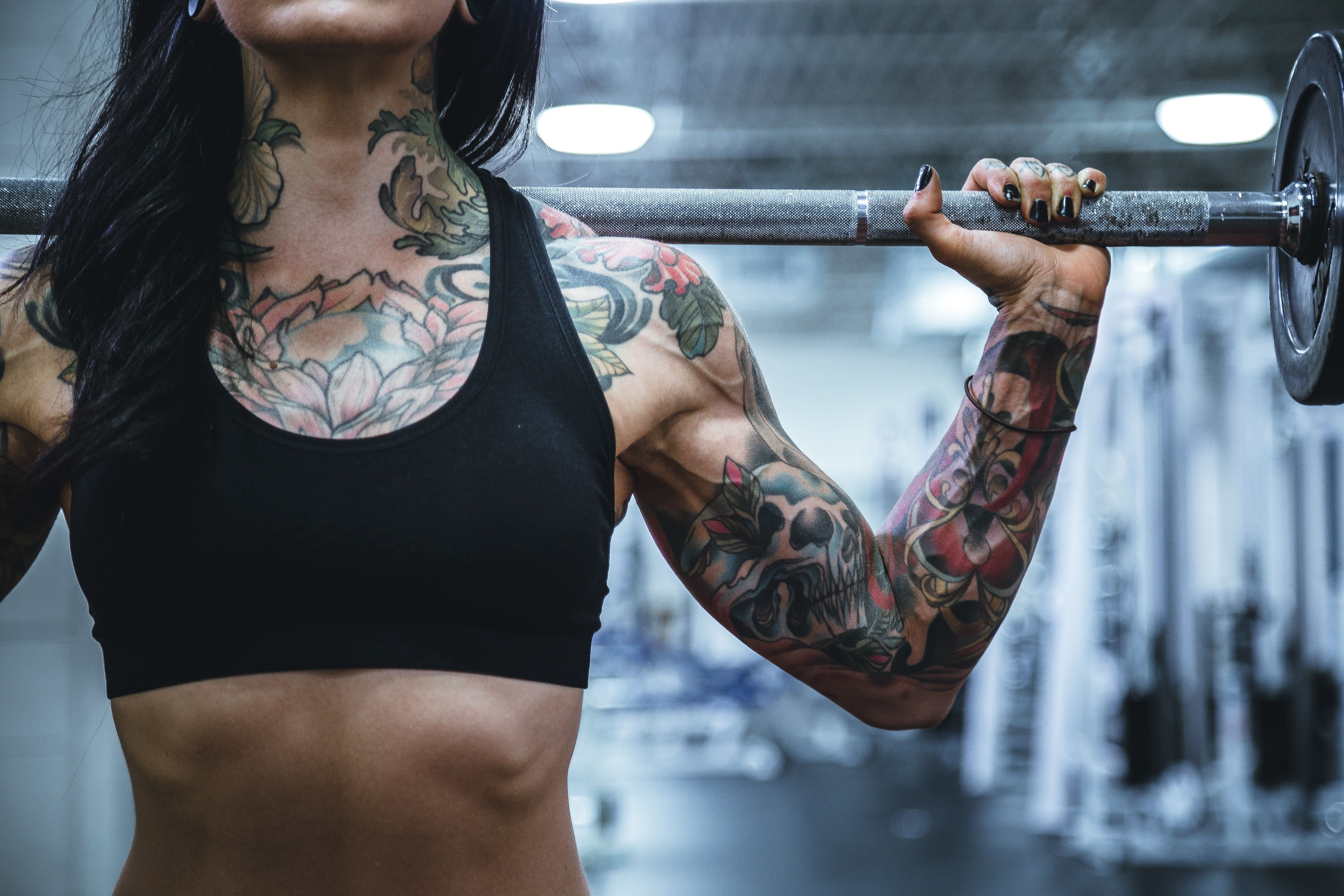 Female doing barbell workout