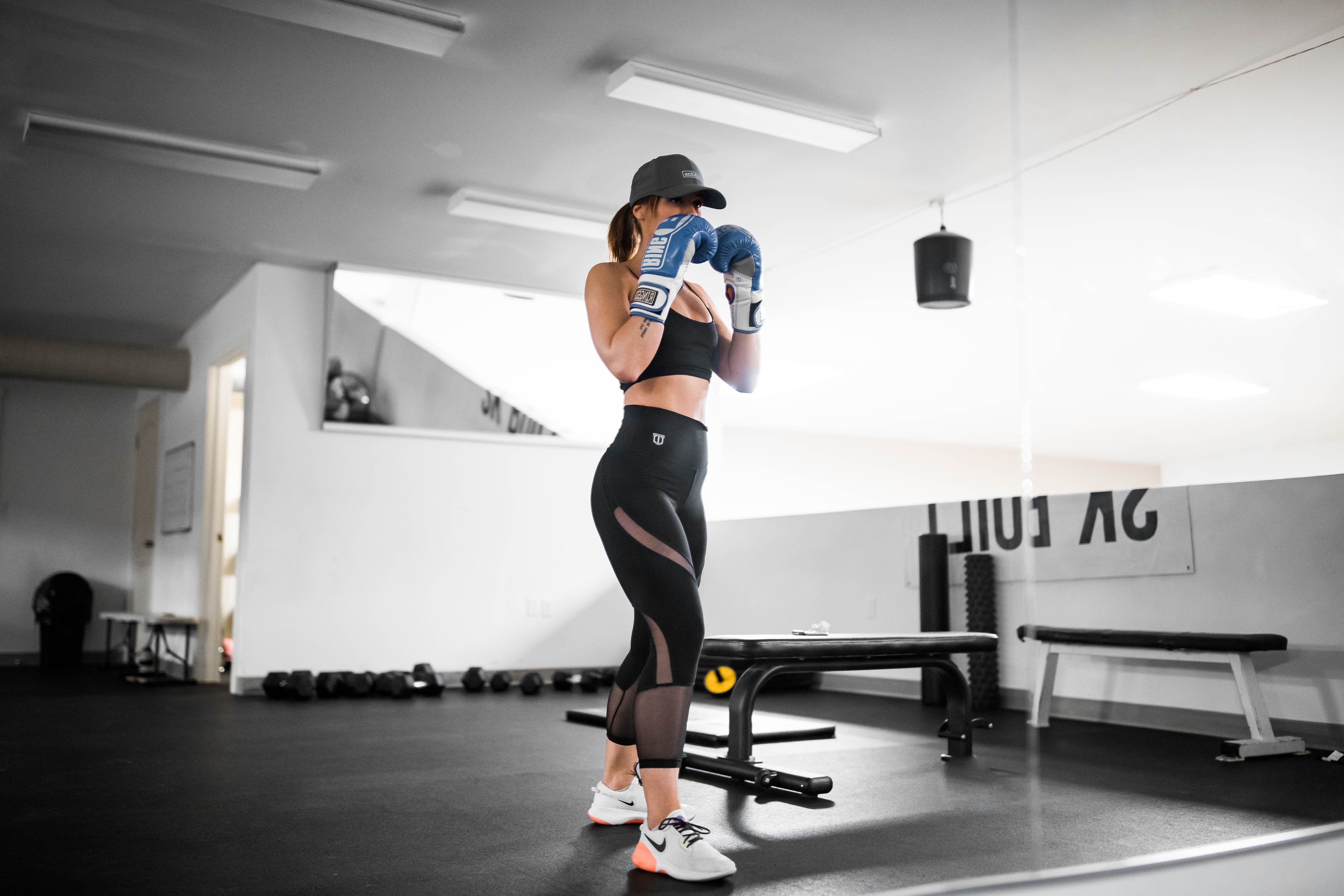 Female boxer at a gym doing workout
