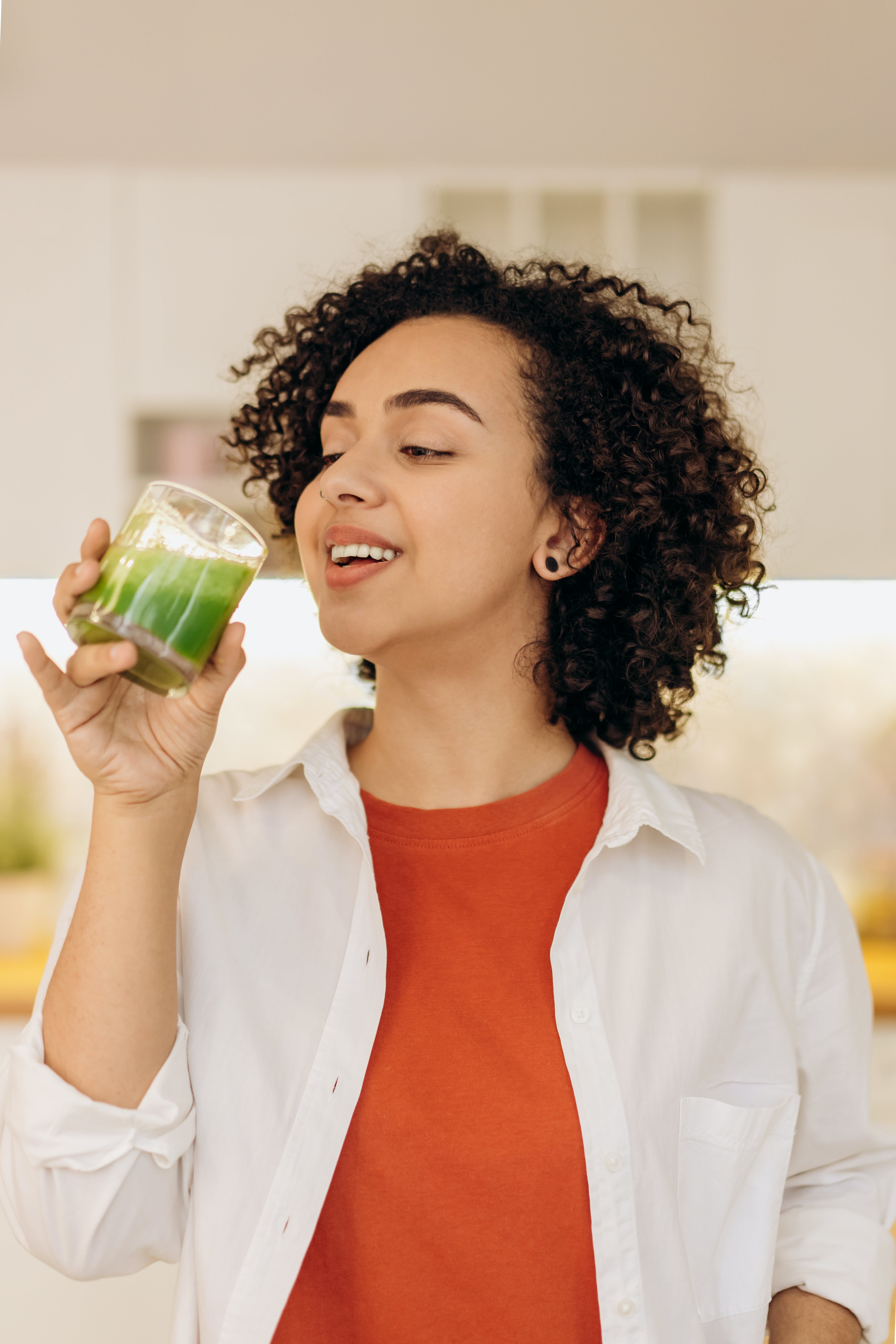 Woman drinks protein shake