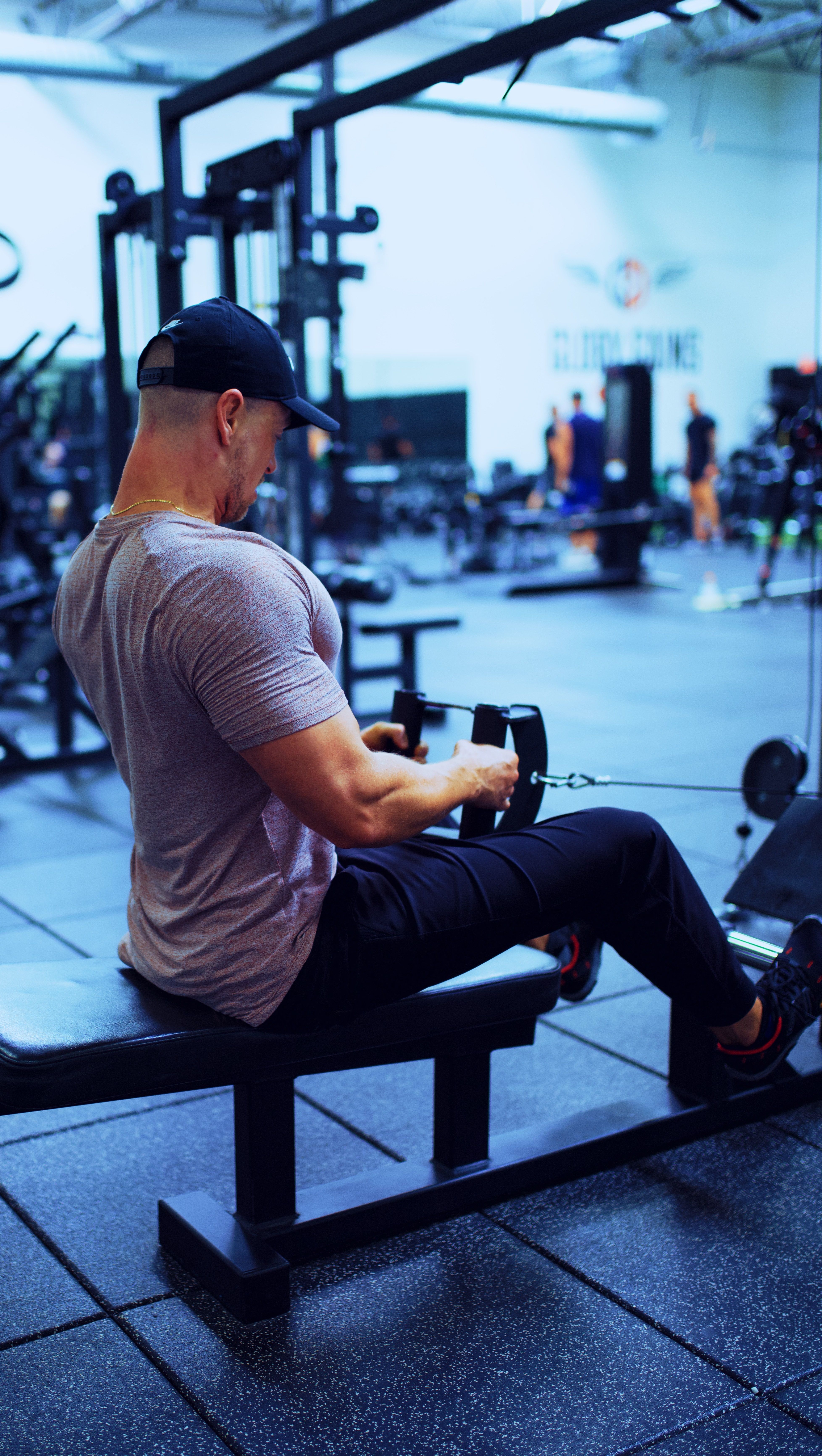 Men in gym wearing grey shirt